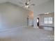 Spacious living room with high ceilings and neutral color palette at 125 Ariel Dr, Mooresville, NC 28117