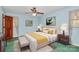 Bedroom with light blue walls, a bed, and a bedside table at 1801 Windsor Dr, Lancaster, SC 29720