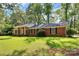 Brick ranch house with large yard and mature trees at 1801 Windsor Dr, Lancaster, SC 29720