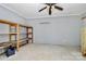 Workshop interior with wooden shelves and file cabinet at 1801 Windsor Dr, Lancaster, SC 29720