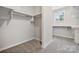 Walk-in closet with multiple levels of shelving and storage at 133 Jentri Way, Mooresville, NC 28115