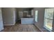 Stylish kitchen featuring a center island, stainless sink, and plenty of natural light at 2280 Dale Earnhardt Blvd, Kannapolis, NC 28083