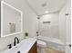 Modern bathroom with white vanity and bathtub at 2600 Alleghany St, Charlotte, NC 28208