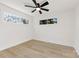 Spacious bedroom with light hardwood floors and ceiling fan at 2600 Alleghany St, Charlotte, NC 28208