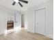 Light-filled bedroom with access to bathroom and closet at 2600 Alleghany St, Charlotte, NC 28208
