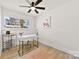 Bedroom with a desk, ceiling fan, and window at 2600 Alleghany St, Charlotte, NC 28208