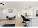 Bright hallway with light hardwood floors and neutral walls at 2600 Alleghany St, Charlotte, NC 28208