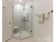 Bathroom with white subway tile shower and glass door at 4301 Fairview Oaks Dr, Charlotte, NC 28211