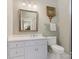 Clean bathroom with white vanity and a toilet at 4301 Fairview Oaks Dr, Charlotte, NC 28211