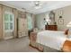 Bedroom with a dresser and a queen-size bed at 4301 Fairview Oaks Dr, Charlotte, NC 28211