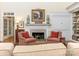 Elegant fireplace with built-in shelving and cabinetry at 4301 Fairview Oaks Dr, Charlotte, NC 28211