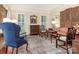 Charming living room with hardwood floors, and comfortable seating at 4301 Fairview Oaks Dr, Charlotte, NC 28211