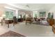 Home office with desk, seating area, and built-ins at 4301 Fairview Oaks Dr, Charlotte, NC 28211