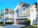 A home with stone accents, a large garage door, and neutral siding at 11521 Allen A Brown Rd, Charlotte, NC 28269