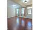 Bright living area featuring hardwood floors and natural light from the windows at 11521 Allen A Brown Rd, Charlotte, NC 28269