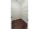 Walk-in closet with modern wood floors, and wire shelving at 11521 Allen A Brown Rd, Charlotte, NC 28269