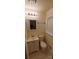 Updated bathroom with white vanity and fixtures at 12608 Rocky River Church Rd, Charlotte, NC 28215