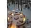 Enjoy the winter nights by the fire pit after a fresh snowfall at 167 Maple View Dr, Troutman, NC 28166