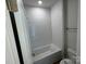 Simple bathroom with a shower/tub combo and white tile at 5027 Mclaughlin Loop # 61, Waxhaw, NC 28173