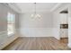 Bright dining room with chandelier and wainscoting at 5027 Mclaughlin Loop # 61, Waxhaw, NC 28173