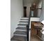 Modern staircase with metal railings at 5027 Mclaughlin Loop # 61, Waxhaw, NC 28173