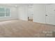 Bright bedroom with neutral carpet and ample natural light from a large window at 8736 Acadia Pkwy # 601, Sherrills Ford, NC 28673