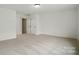 Bright bedroom with plush carpet, neutral walls, and white trim, creating a tranquil and inviting retreat at 8736 Acadia Pkwy # 601, Sherrills Ford, NC 28673