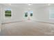 Large bonus room with three windows providing ample natural light at 8736 Acadia Pkwy # 601, Sherrills Ford, NC 28673