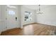 Bright foyer with light-colored wood flooring, white walls, and a view of the front yard at 8736 Acadia Pkwy # 601, Sherrills Ford, NC 28673