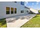 Spacious back patio ideal for outdoor entertaining and relaxation at 16004 Deer River Rd, Charlotte, NC 28278