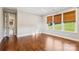Bedroom with windows offering natural light, and hardwood floors at 16004 Deer River Rd, Charlotte, NC 28278