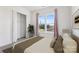 Bright bedroom features a large window, closet, and neutral decor at 16004 Deer River Rd, Charlotte, NC 28278