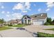 Attractive home exterior in a neighborhood setting with well-maintained lawns and driveways at 16004 Deer River Rd, Charlotte, NC 28278