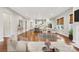 Open-concept living space flows from the living room to the modern kitchen, perfect for entertaining guests at 16004 Deer River Rd, Charlotte, NC 28278