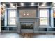 Modern fireplace with dark blue built-in shelving at 1418 Malden Ct, Crouse, NC 28033