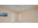 Empty bedroom with neutral carpet, two doors, and neutral walls at 5888 Hidden Oaks Ln, Clover, SC 29710