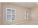 Bedroom features two large windows for abundant natural light at 5888 Hidden Oaks Ln, Clover, SC 29710