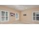 Bright bedroom with neutral carpet, a large window, and neutral walls at 5888 Hidden Oaks Ln, Clover, SC 29710