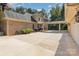 Expansive driveway with portico for convenient covered access to home and multiple car garage at 5888 Hidden Oaks Ln, Clover, SC 29710