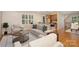 Comfortable living room with hardwood floors and natural light at 5888 Hidden Oaks Ln, Clover, SC 29710