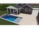 Rendering shows a backyard with inground pool, hot tub, and screened in porch at 5888 Hidden Oaks Ln, Clover, SC 29710