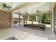 Spacious screened porch with outdoor ceiling fans at 5888 Hidden Oaks Ln, Clover, SC 29710