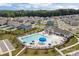 Community pool with surrounding houses and landscaping at 181 Atwater Landing Dr, Mooresville, NC 28117