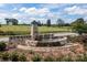 Community entrance with a water feature and landscaping at 181 Atwater Landing Dr, Mooresville, NC 28117