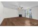 Living room with hardwood floors and a corner fireplace at 181 Atwater Landing Dr, Mooresville, NC 28117