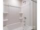 Bathroom with a white tub and shower with plastic surround at 22 Porter Nw St # Sw22, Concord, NC 28027