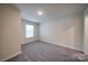 Bedroom featuring gray carpet, one window, and cream-colored walls at 22 Porter Nw St # Sw22, Concord, NC 28027