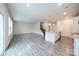 Open-concept living room, kitchen and staircase area at 22 Porter Nw St # Sw22, Concord, NC 28027