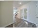 Bright foyer features stylish flooring, white trim, and a view of the staircase at 22 Porter Nw St # Sw22, Concord, NC 28027