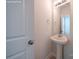 Elegant powder room with pedestal sink and neutral decor at 22 Porter Nw St # Sw22, Concord, NC 28027